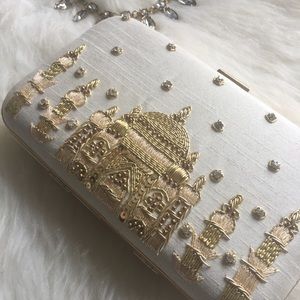 White clutch with gold embroidery bridal